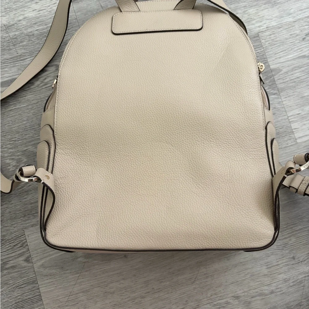 kate spade pebble leather backpack in cream with gold hardware